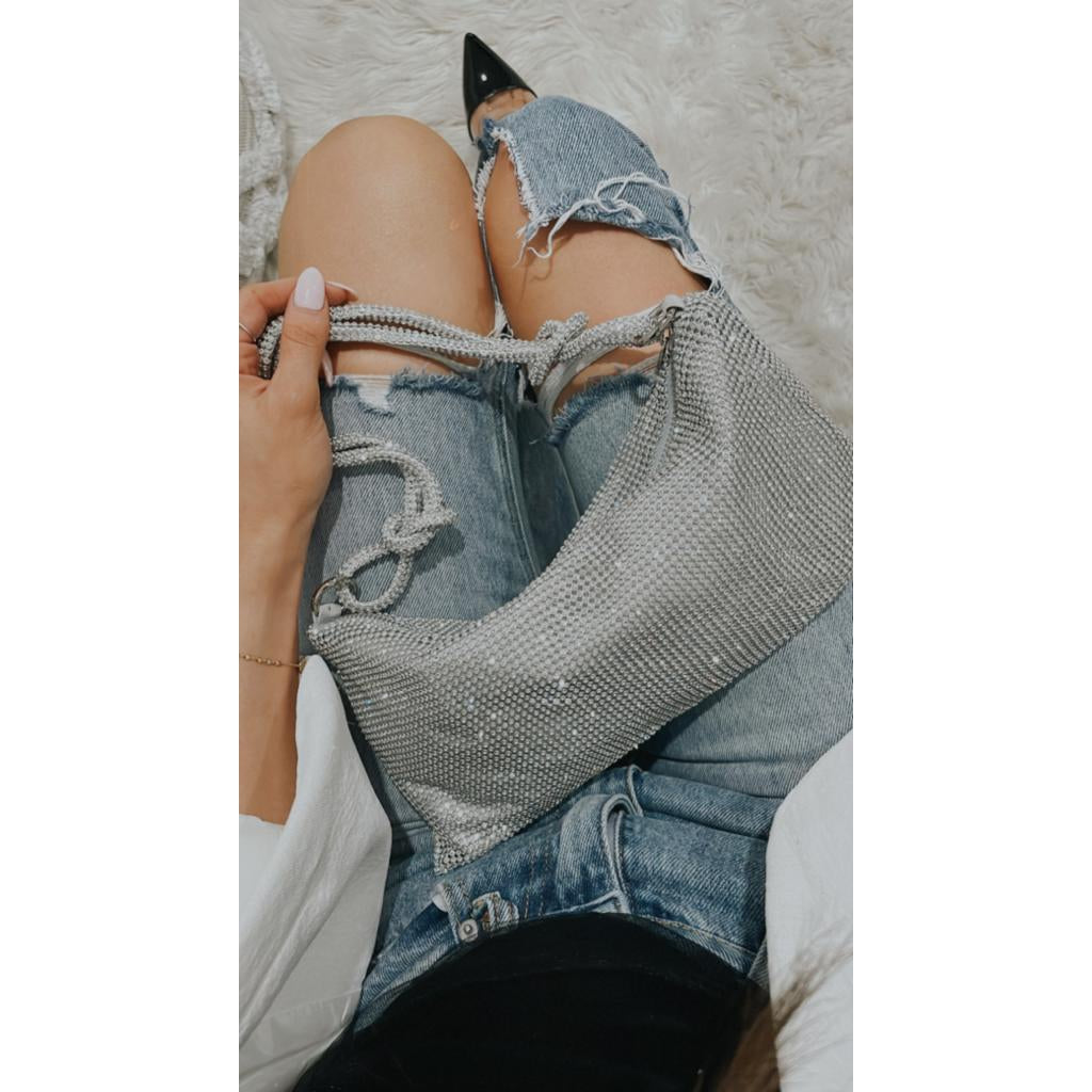 Gigi Hangbag Silver Diamnate | Pre-OrderThe Gigi Handbag is the ultimate showstopper, encrusted with diamante crystals will finish off any outfit with glam !
slouch shape
top zip opening with silver hardwAlina Collctions AusAlina Collctions AusGigi Hangbag Silver Diamnate