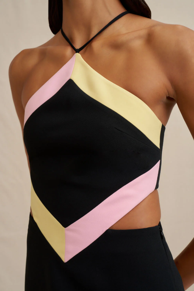 Diamond Halter Mini Dress — the bodice is detailed with subtle front cut-outs at the waist and has a laced tie-up back for an adjustable fit